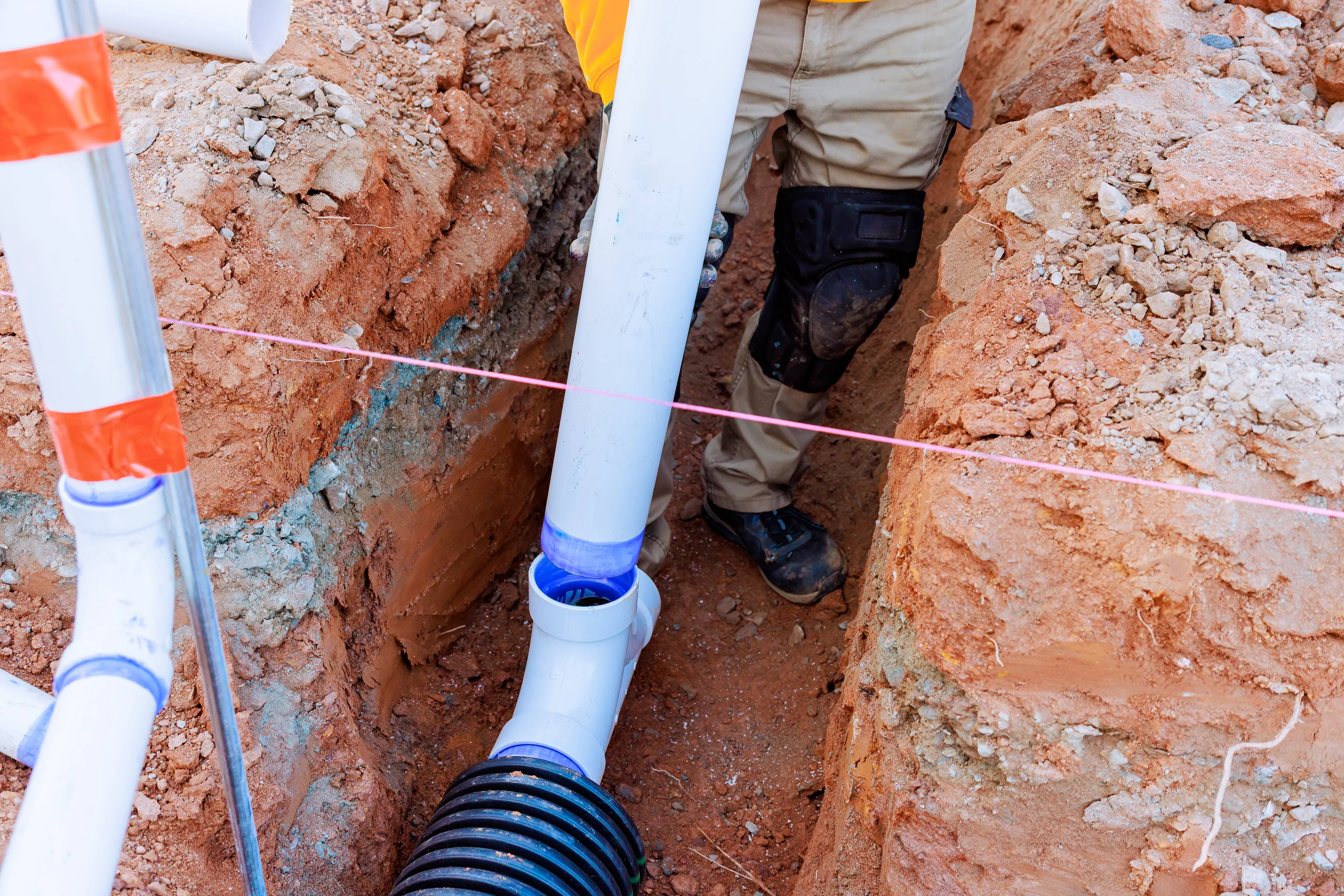 Drainage and sewer pipes laid in an excavated trench